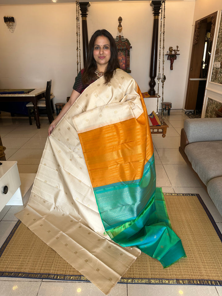 Offwhite with Double Coloured Border Mustard and Sea Green , Rich Annam and Rudraksh Zari Butta, Rich pallu ,Kanjivaram Pure Zari Silk Saree