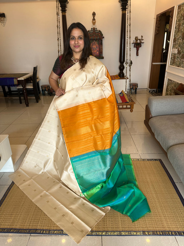 Offwhite with Double Coloured Border Mustard and Sea Green , Rich Annam and Rudraksh Zari Butta, Rich pallu ,Kanjivaram Pure Zari Silk Saree