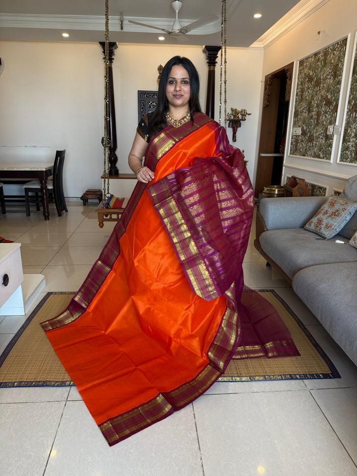Orange with Magenta  ,traditional rich borders and grand Pallu korvai Silk Cotton Saree