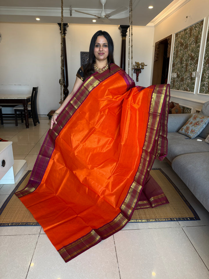 Orange with Magenta  ,traditional rich borders and grand Pallu korvai Silk Cotton Saree