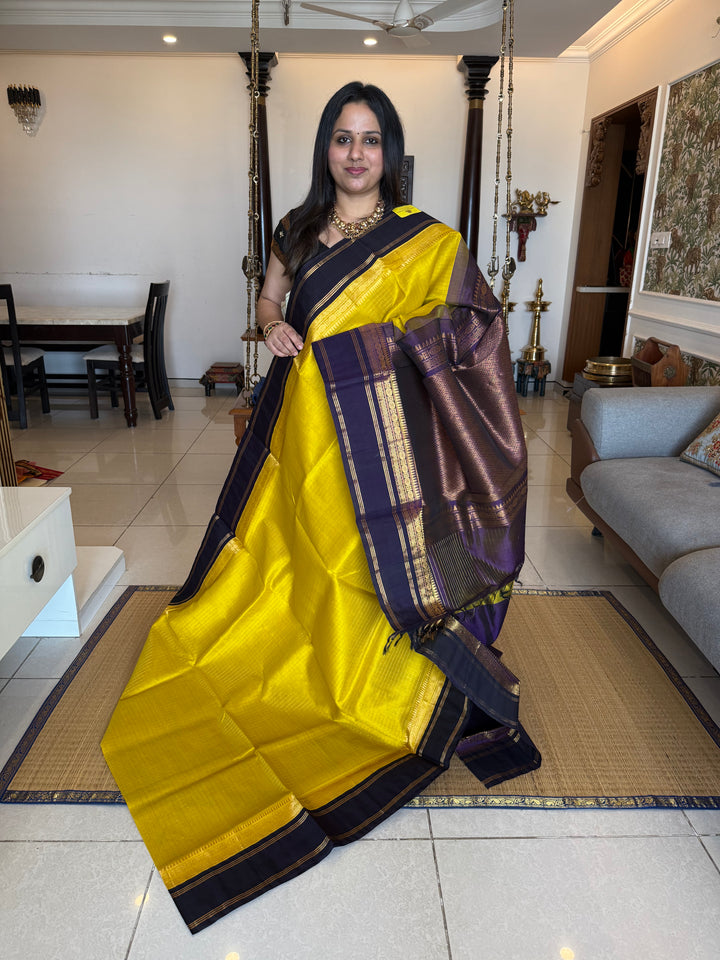 Lemon Yellow with Dark Blue , zari kattam in the body ,rettapet border and rich Pallu Korvai Silk Cotton Saree