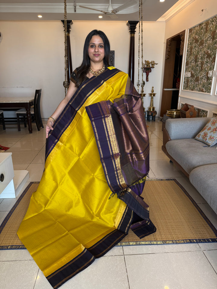 Lemon Yellow with Dark Blue , zari kattam in the body ,rettapet border and rich Pallu Korvai Silk Cotton Saree