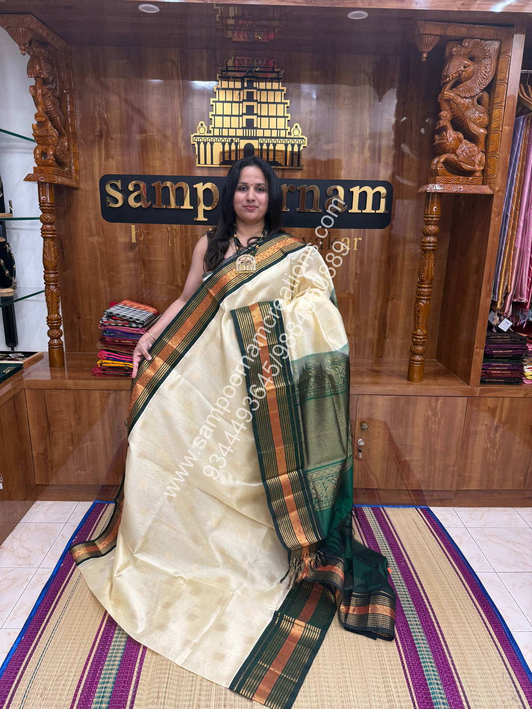 Cream with Dark Green  , Annam and Chakram Zari butta in the body , Rich Kanchi border , Grand Pallu Korvai Silk Cotton Saree , Annam and Chakram Zari butta in the body , Rich Kanchi border , Grand Pallu Korvai Silk Cotton Saree