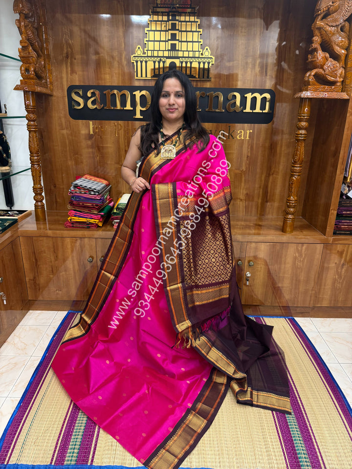 Rani Pink with Brown , rich Zari butta in the body and Traditional borders , Grand Pallu Korvai Silk Cotton Saree