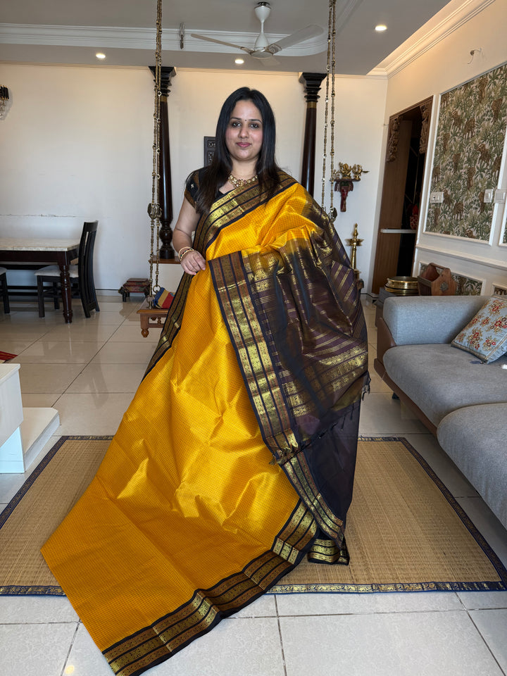 Mambazha Manjal with Brown , Podi Kattam in the body ,rich kanchi border and traditionl pallu Korvai Silk Cotton Saree