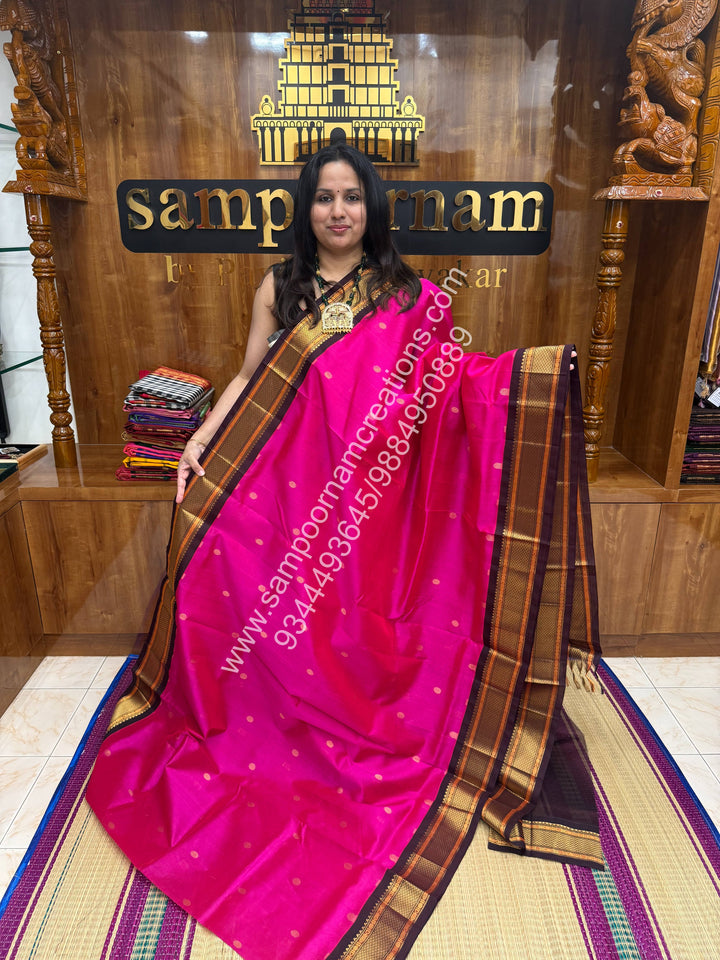 Rani Pink with Brown , rich Zari butta in the body and Traditional borders , Grand Pallu Korvai Silk Cotton Saree