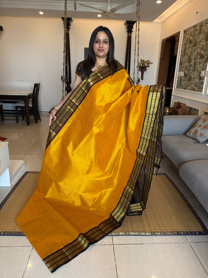 Mambazha Manjal with Brown , Podi Kattam in the body ,rich kanchi border and traditionl pallu Korvai Silk Cotton Saree