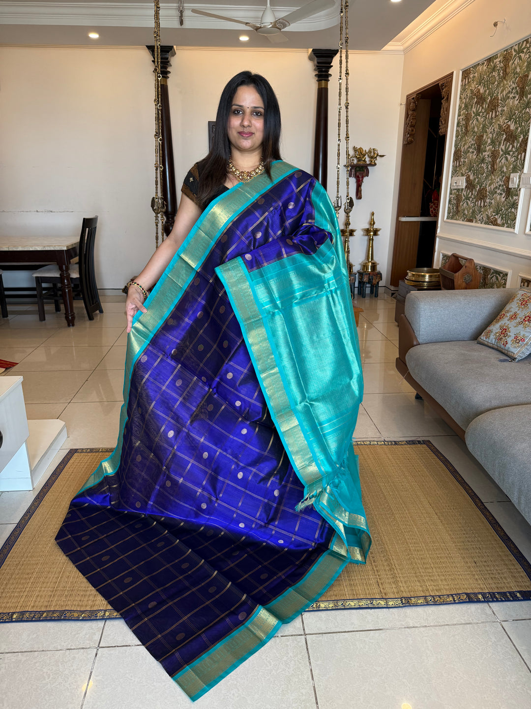 Dark Blue with Light Blue , rich Zari checks in the body with zari butta , ,traditional borders and rich Pallu korvai Silk Cotton Saree