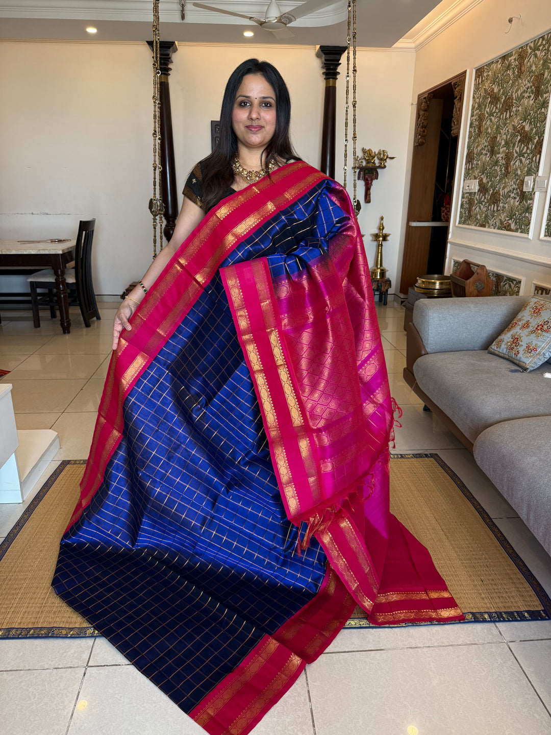 Blue with Pink , zari checks in the body , rettepet border and rich Pallu Korvai Silk Cotton Saree