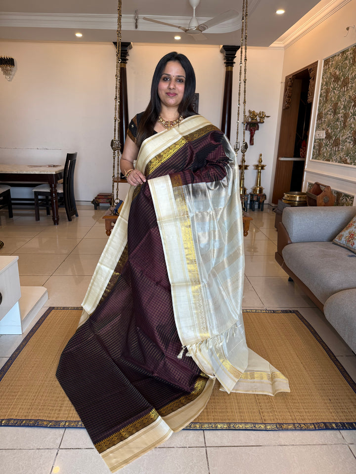 Dark Brown with Offwhite , zari kattam in the body ,rettapet border and rich Pallu Korvai Silk Cotton Saree