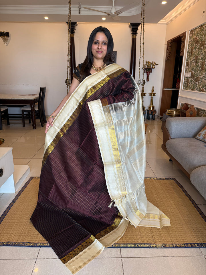 Dark Brown with Offwhite , zari kattam in the body ,rettapet border and rich Pallu Korvai Silk Cotton Saree
