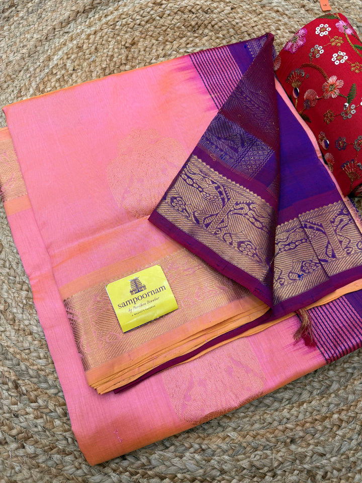 Peachish Pink with Magenta   ,  Rich Gandaberunda  Zari butta in the body , Traditional Borders and Rich Pallu Silk Cotton Saree