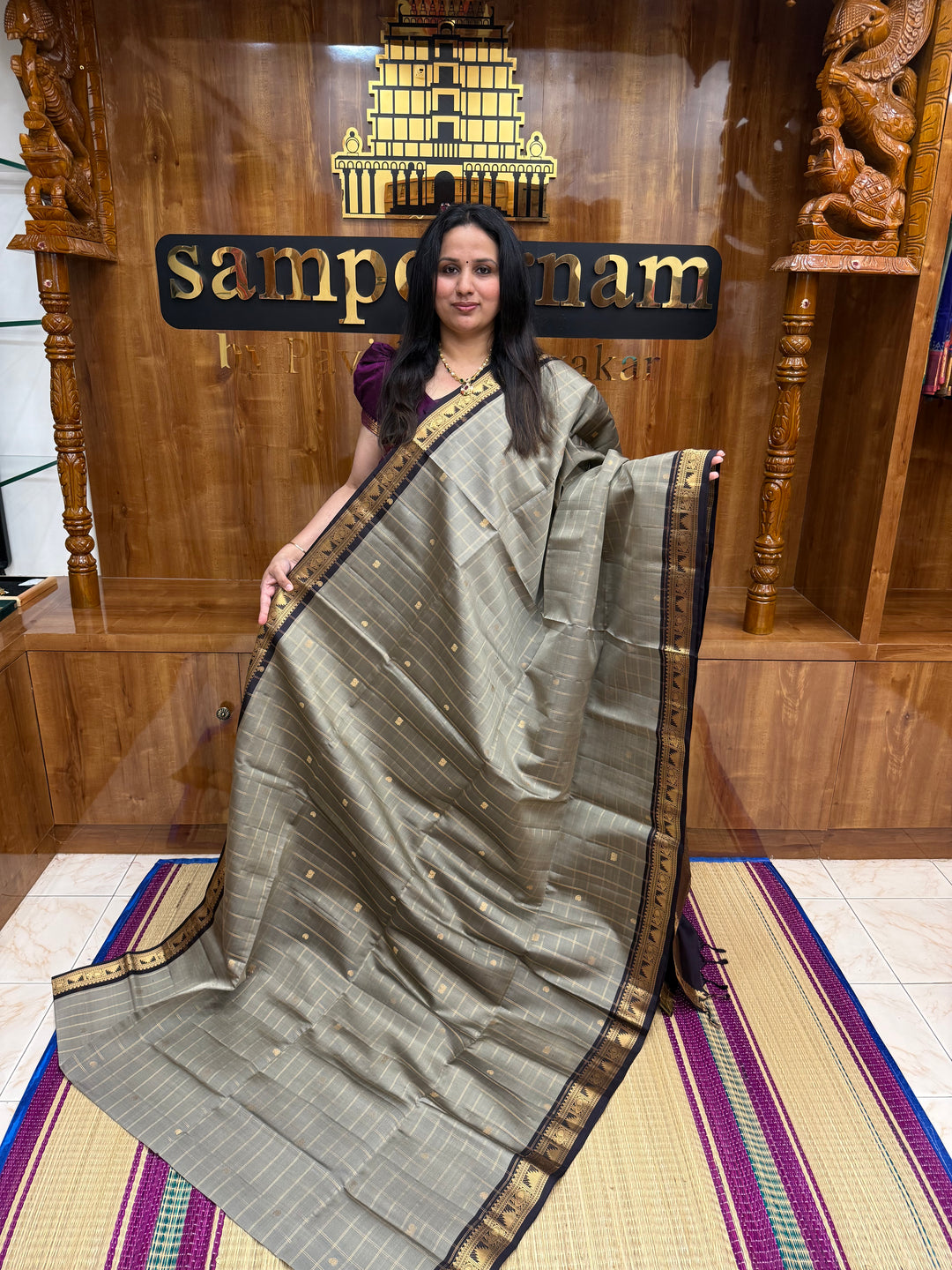 Elegant Grey with Black , Rich Zari Checks with Mango & Mayil buttta in the body and Grand Pallu Pure Soft Silk Saree