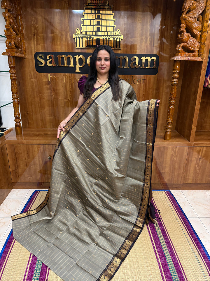Elegant Grey with Black , Rich Zari Checks with Mango & Mayil buttta in the body and Grand Pallu Pure Soft Silk Saree