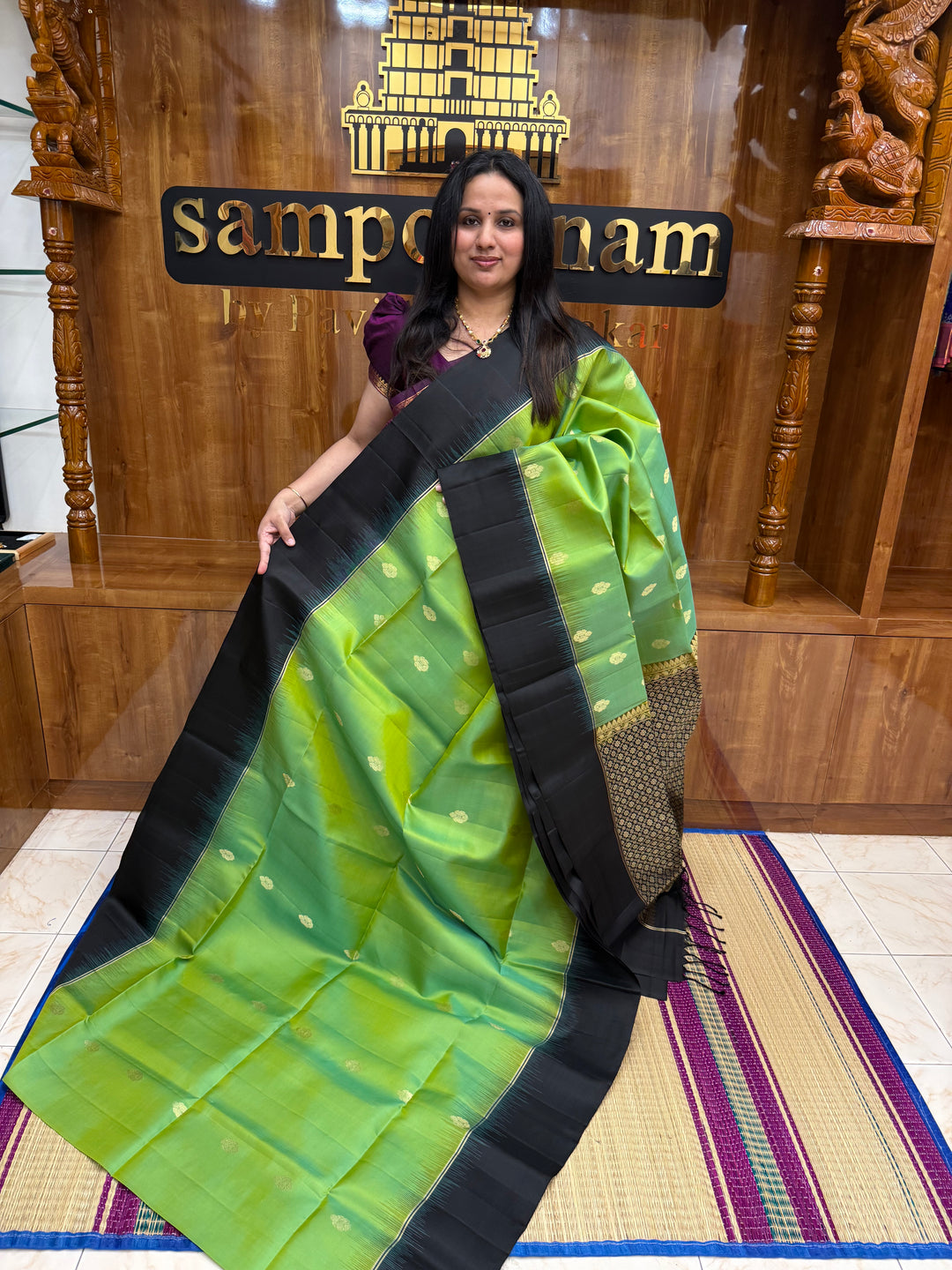 Pastel Green with Black , Rich Mango Zari Butta in the body and Grand Pallu Pure Soft Silk Saree