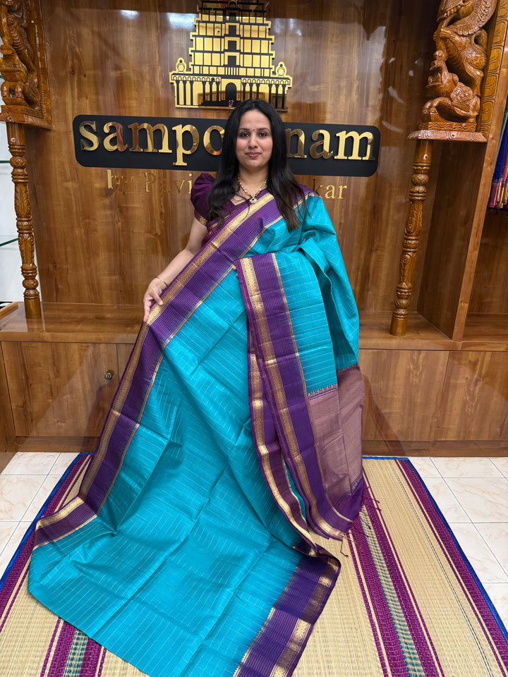Ramar Blue with Purple , Rich Zari Checks in the body and Grand Pallu Pure Soft Silk Saree