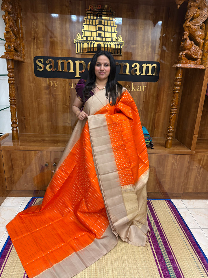 Fanta Orange with Beige , Rich Gold & Silver Floral Butta in the body and Grand Pallu Pure Soft Silk Saree