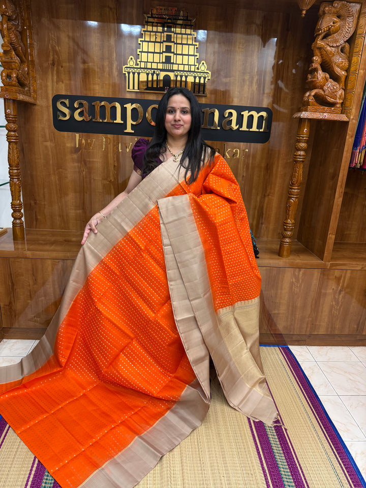 Fanta Orange with Beige , Rich Gold & Silver Floral Butta in the body and Grand Pallu Pure Soft Silk Saree