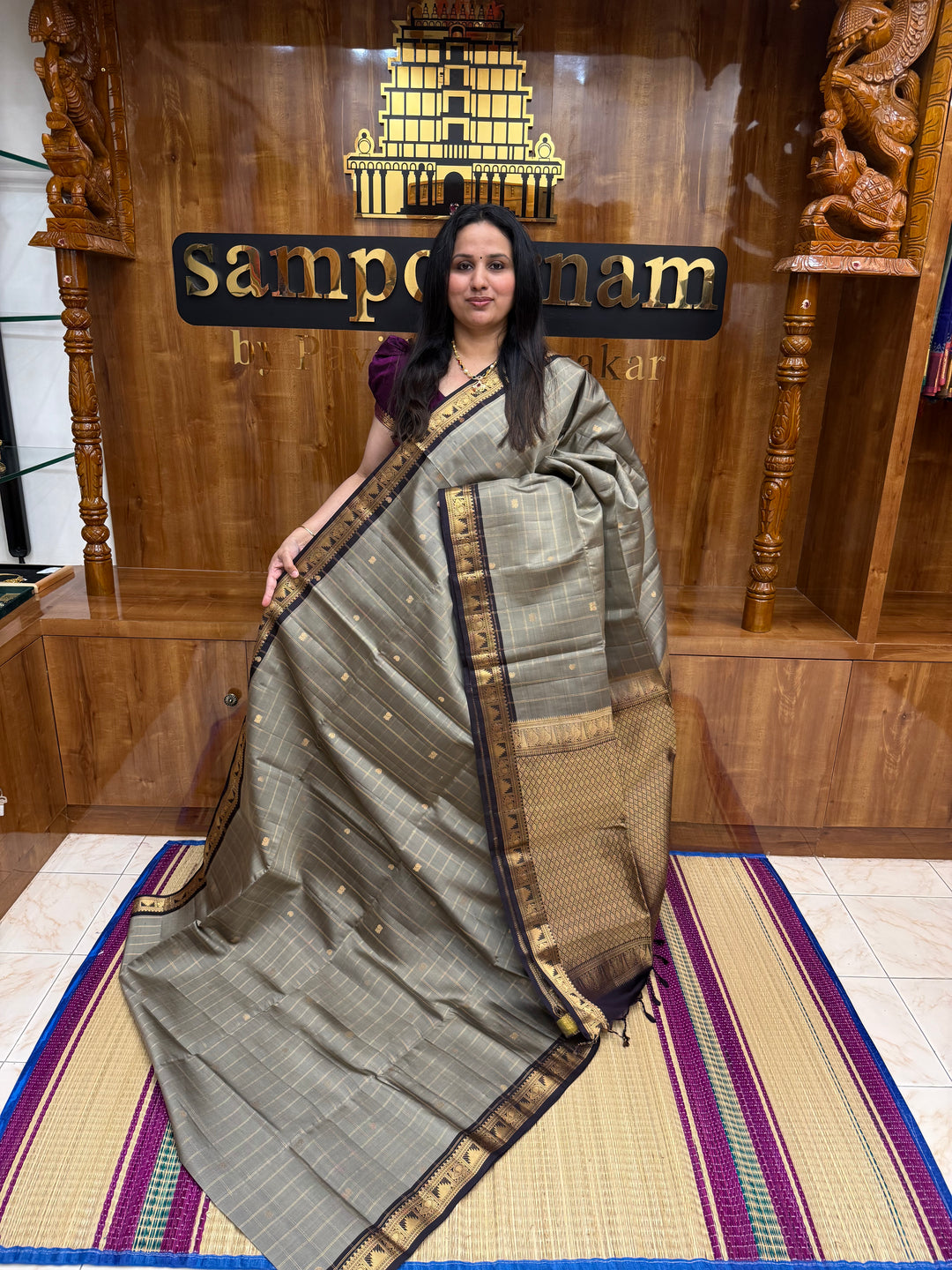 Elegant Grey with Black , Rich Zari Checks with Mango & Mayil buttta in the body and Grand Pallu Pure Soft Silk Saree