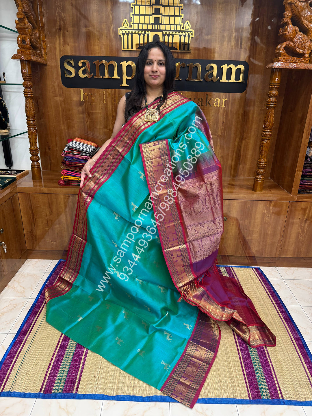 Ramar Green with Magenta , rich Deer Zari butta in the body and traditional one side long borders , Grand Pallu Korvai Silk Cotton Saree