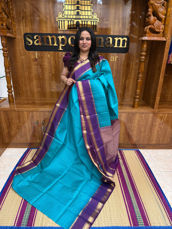 Ramar Blue with Purple , Rich Zari Checks in the body and Grand Pallu Pure Soft Silk Saree