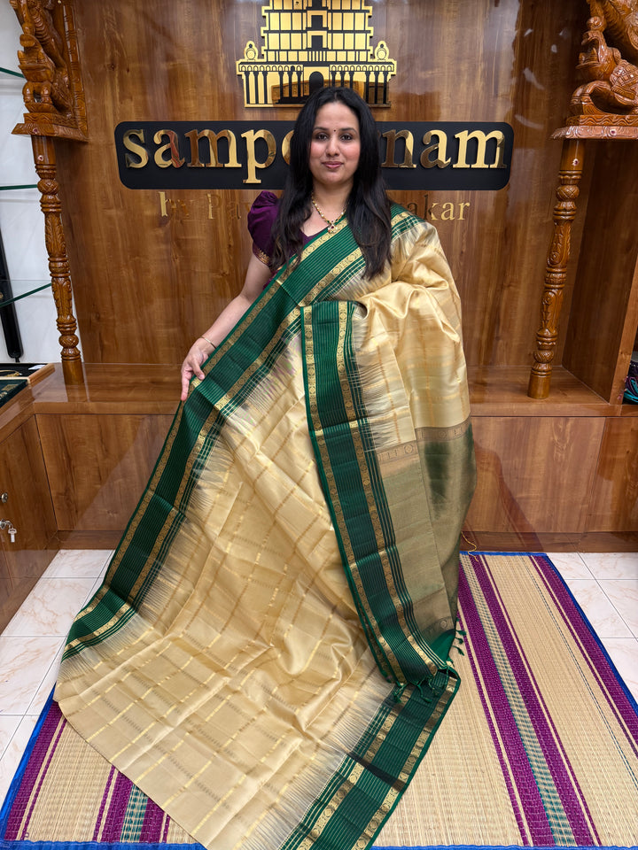 Ivory with Dark Green  , Rich Zari Checks in the body and Grand Pallu Pure Soft Silk Saree