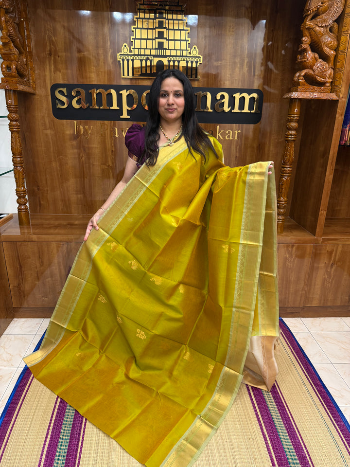 Double Shaded  Manthulir Green with Cream  ,  Rich Mayil and Mango Zari butta in the body , Traditional  Borders and Rich Pallu Silk Cotton Saree