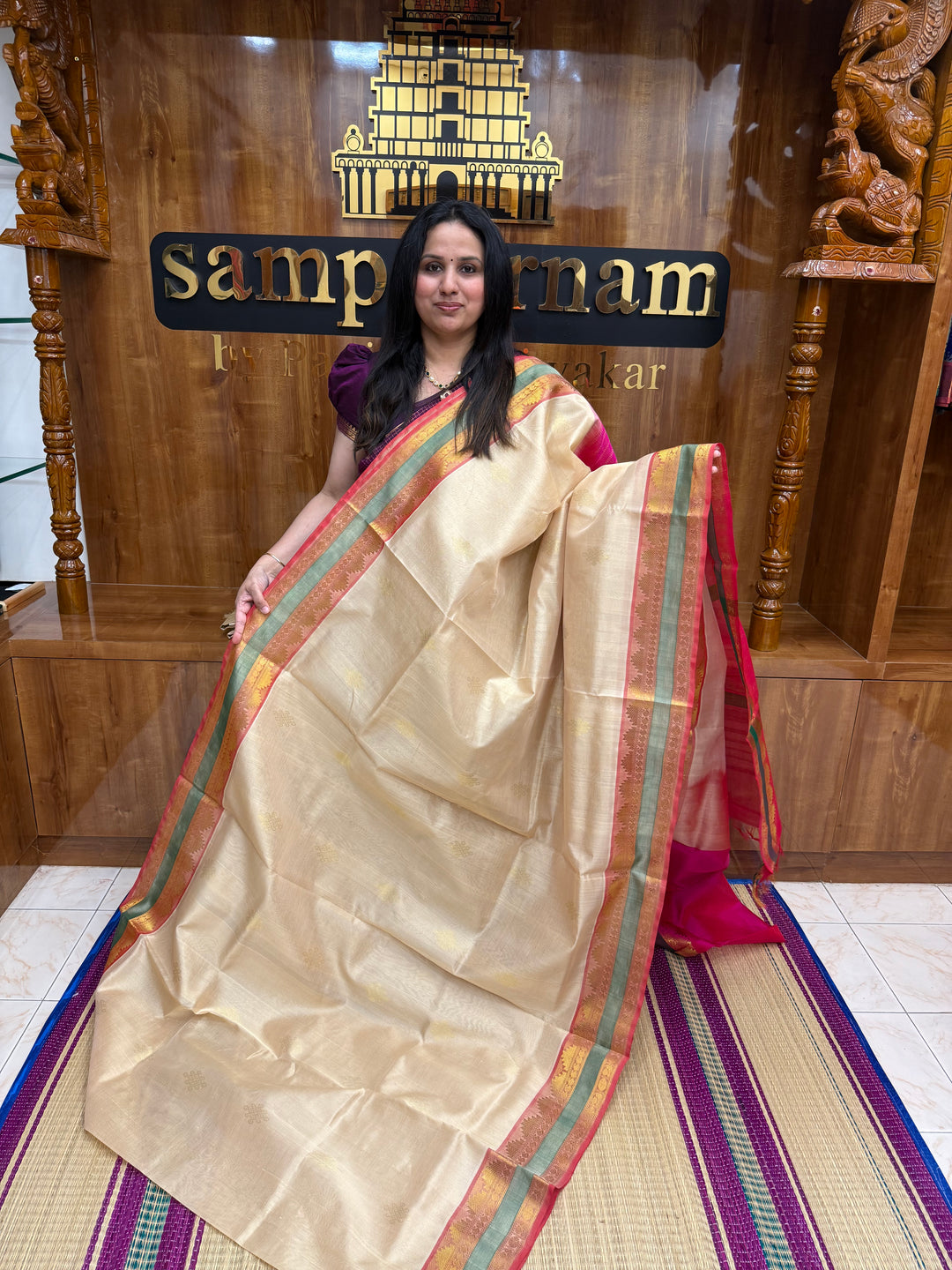 Offwhite with Pink  ,  Rich Kolam Zari butta in the body , Rettapet  Borders and Rich Pallu Silk Cotton Saree