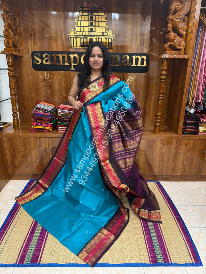 Ramar Blue with Dark Jamun , Zari butta in the body and Lakshadeepam Border , Grand Pallu Korvai Silk Cotton Saree