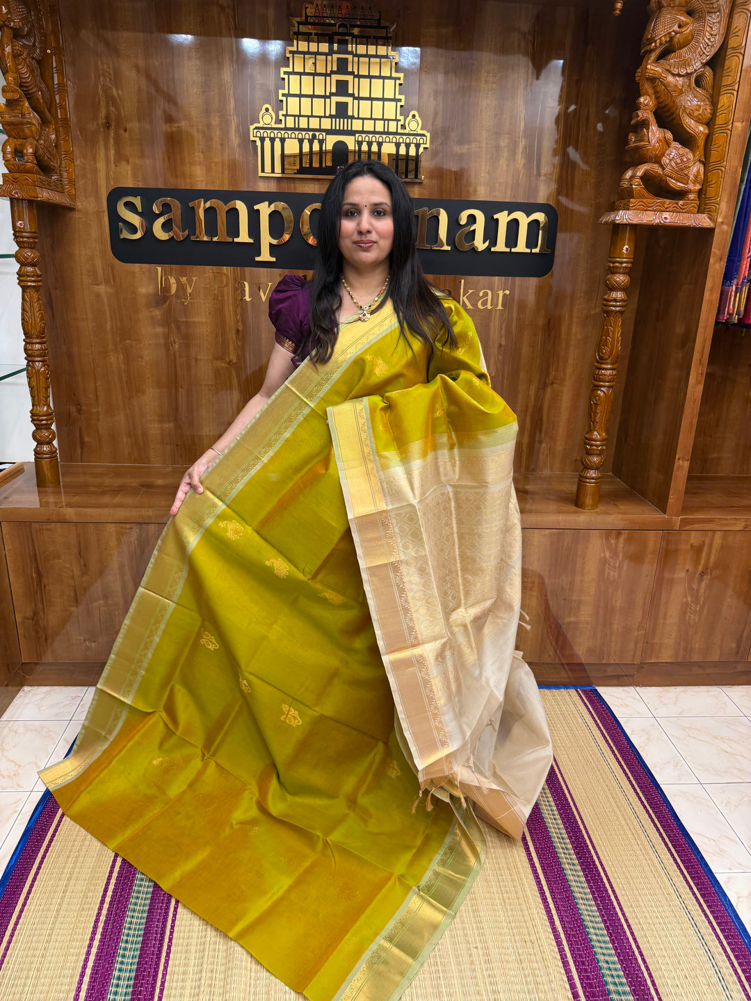 Double Shaded  Manthulir Green with Cream  ,  Rich Mayil and Mango Zari butta in the body , Traditional  Borders and Rich Pallu Silk Cotton Saree