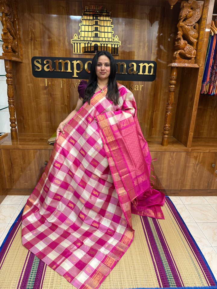 Pink with White , Rich Zari checks with Mayil and Chakram Zari Motif in the body , Traditional  Borders and Rich Pallu Silk Cotton Saree