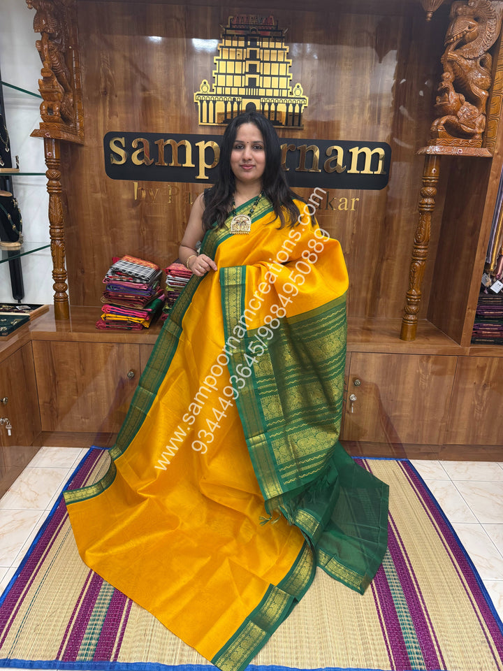 Manjal with Green , Traditional borders and  Grand Pallu Korvai Silk Cotton Saree