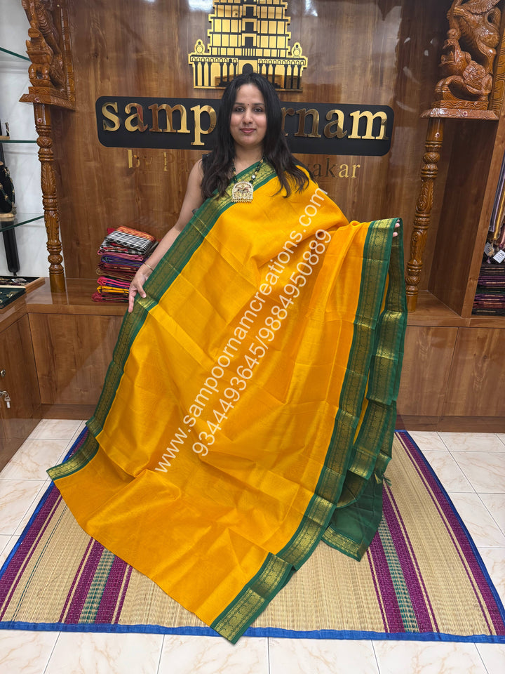 Manjal with Green , Traditional borders and  Grand Pallu Korvai Silk Cotton Saree