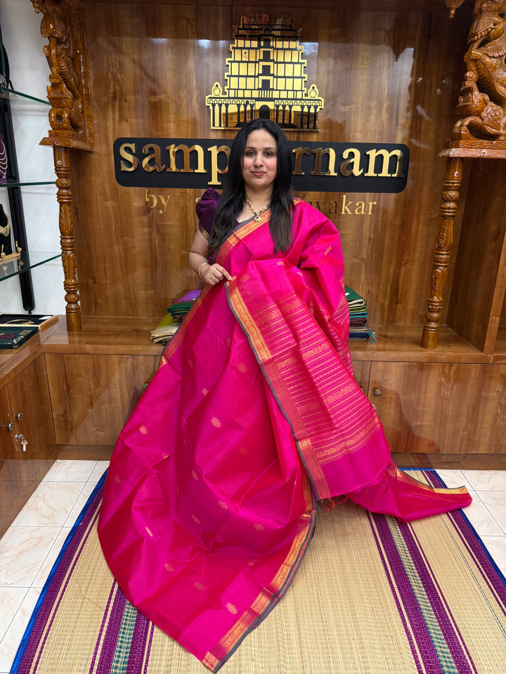 Rani Pink with Green Selvedge  ,  Rich Two Side Peacock  Zari butta in the body ,Traditional  Borders and Rich Pallu Silk Cotton Saree