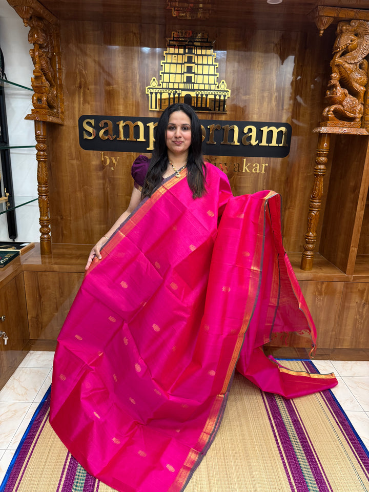 Rani Pink with Green Selvedge  ,  Rich Two Side Peacock  Zari butta in the body ,Traditional  Borders and Rich Pallu Silk Cotton Saree