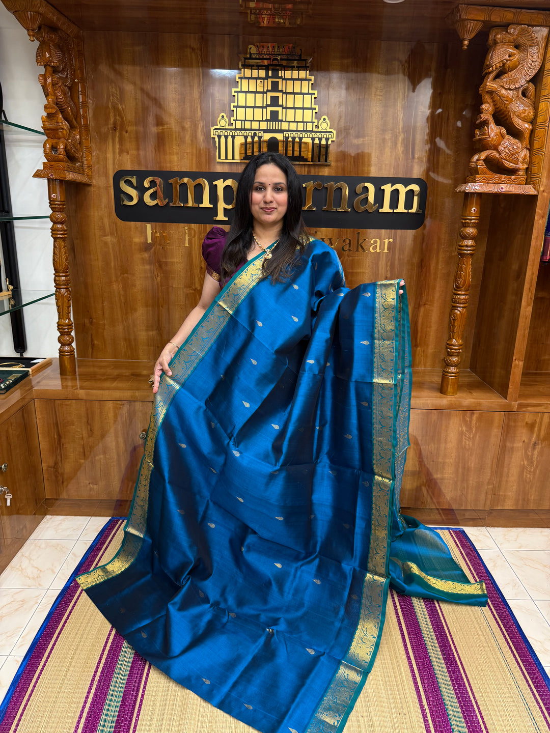 Mayil Blue ,  Rich Tilakam Zari butta in the body , Traditional Borders and Rich Pallu Silk Cotton Saree