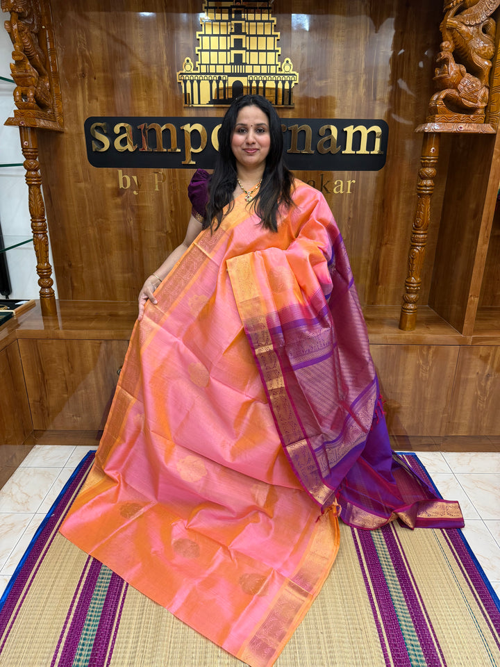 Peachish Pink with Magenta   ,  Rich Gandaberunda  Zari butta in the body , Traditional Borders and Rich Pallu Silk Cotton Saree