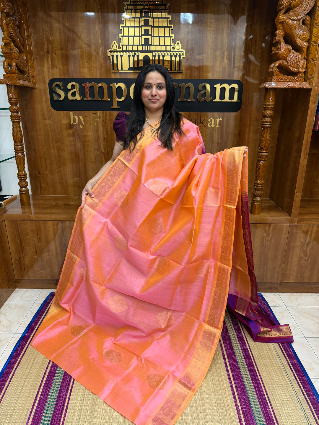 Peachish Pink with Magenta   ,  Rich Gandaberunda  Zari butta in the body , Traditional Borders and Rich Pallu Silk Cotton Saree