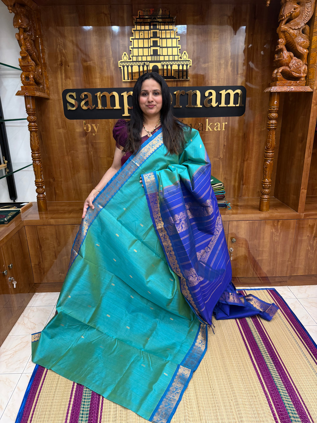 Light Blue with Blue  ,  Rich Mango Zari butta in the body , Traditional Borders and Rich Pallu Silk Cotton Saree