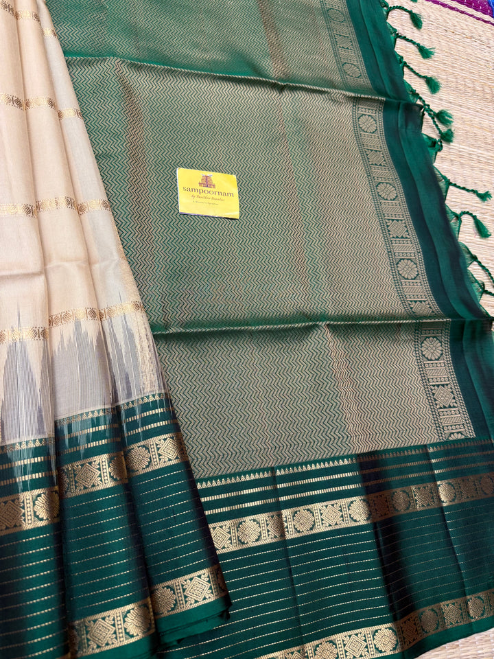 Ivory with Dark Green  , Rich Zari Checks in the body and Grand Pallu Pure Soft Silk Saree