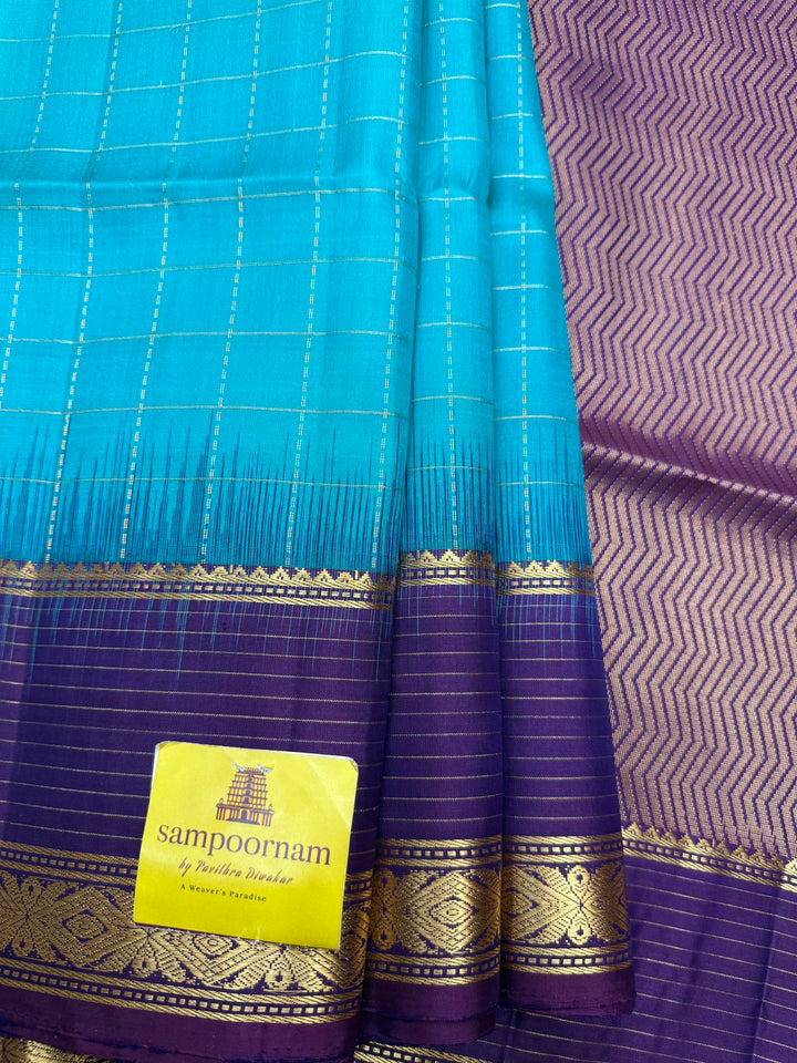 Ramar Blue with Purple , Rich Zari Checks in the body and Grand Pallu Pure Soft Silk Saree