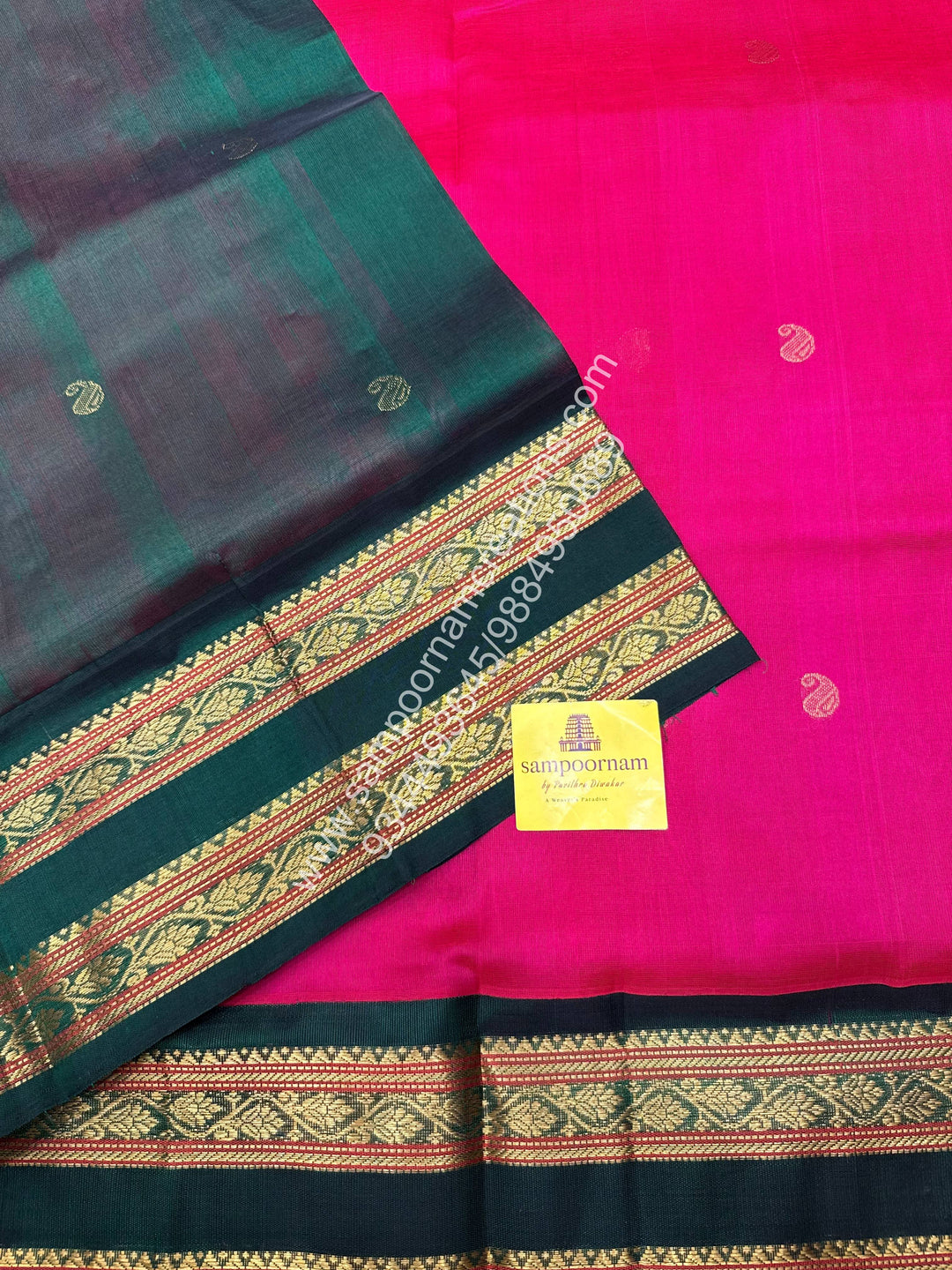 Ruby Pink with Dark Green , rich Mango Zari butta in the body , Rettapet border and  Grand Pallu Korvai Silk Cotton Saree