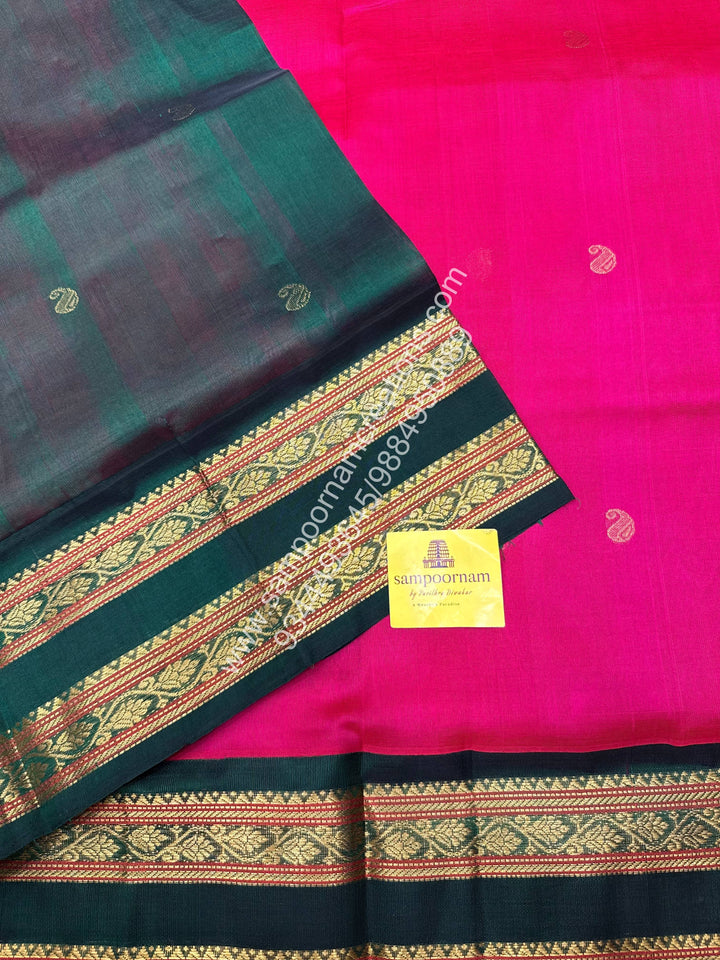 Ruby Pink with Dark Green , rich Mango Zari butta in the body , Rettapet border and  Grand Pallu Korvai Silk Cotton Saree