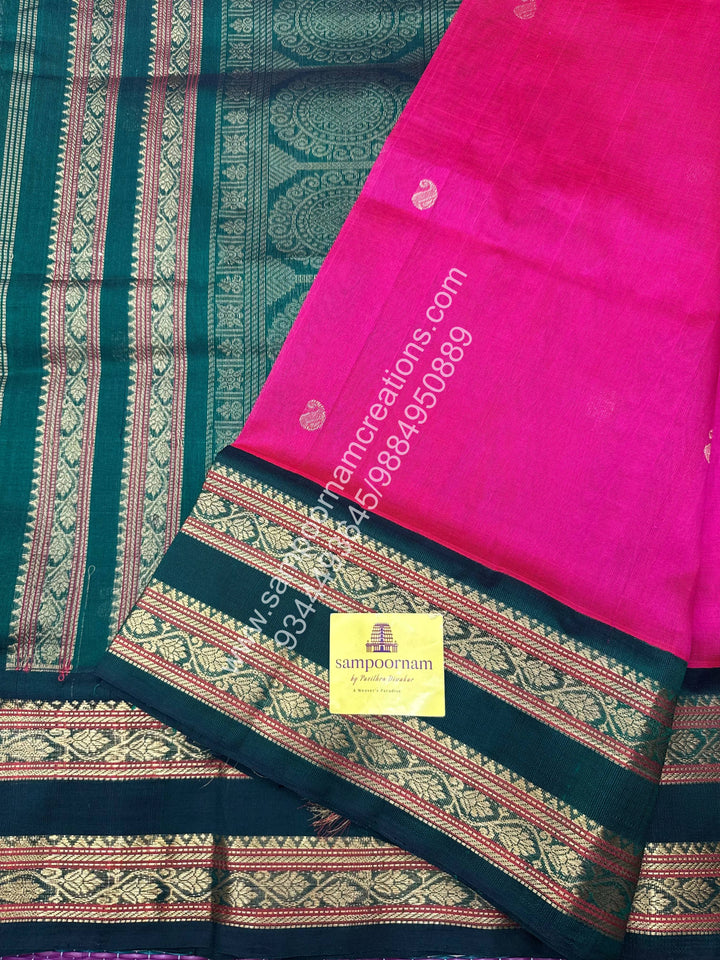 Ruby Pink with Dark Green , rich Mango Zari butta in the body , Rettapet border and  Grand Pallu Korvai Silk Cotton Saree