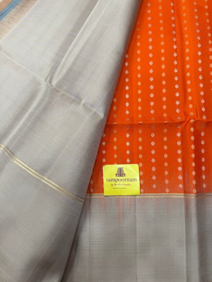 Fanta Orange with Beige , Rich Gold & Silver Floral Butta in the body and Grand Pallu Pure Soft Silk Saree