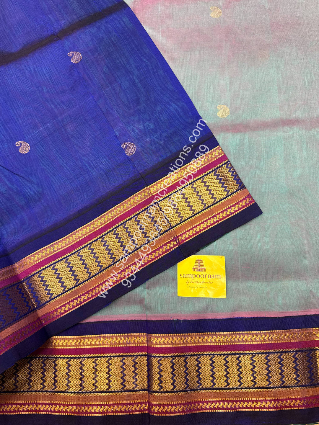Pinkish  Grey with Blue , Rich Mango Zari butta in the body , Traditional borders and Grand Pallu Korvai Silk Cotton Saree