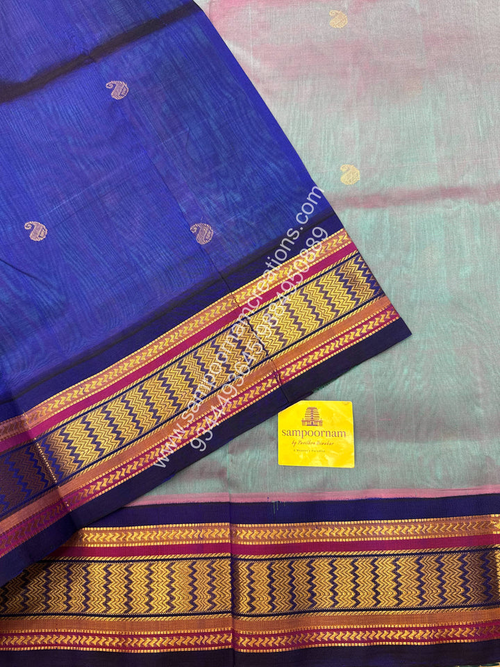 Pinkish  Grey with Blue , Rich Mango Zari butta in the body , Traditional borders and Grand Pallu Korvai Silk Cotton Saree