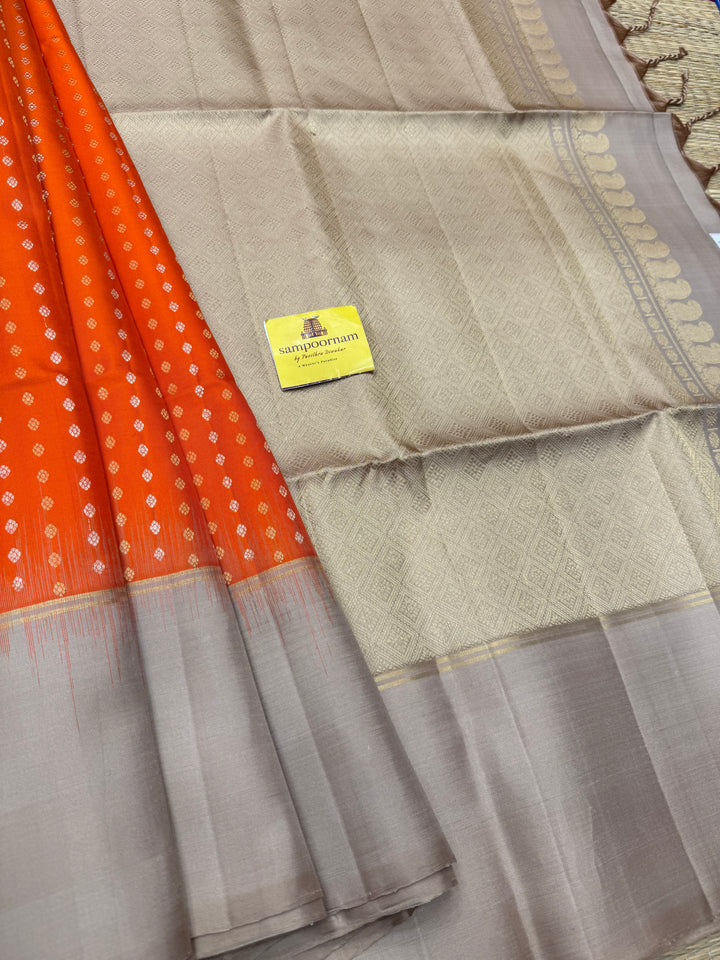 Fanta Orange with Beige , Rich Gold & Silver Floral Butta in the body and Grand Pallu Pure Soft Silk Saree