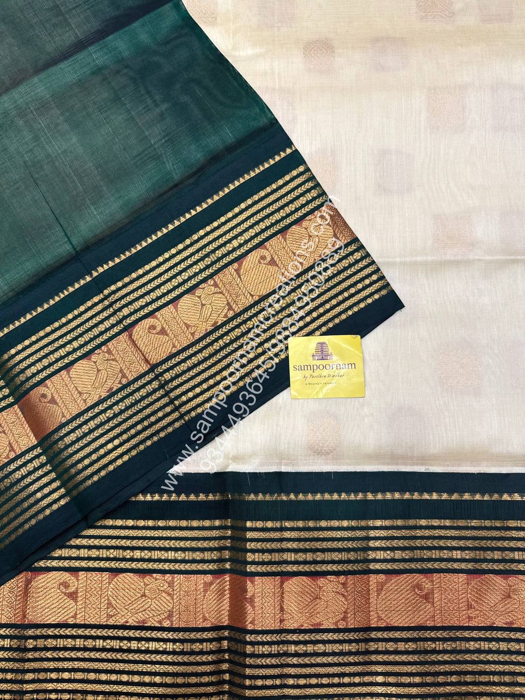 Cream with Dark Green  , Annam and Chakram Zari butta in the body , Rich Kanchi border , Grand Pallu Korvai Silk Cotton Saree , Annam and Chakram Zari butta in the body , Rich Kanchi border , Grand Pallu Korvai Silk Cotton Saree