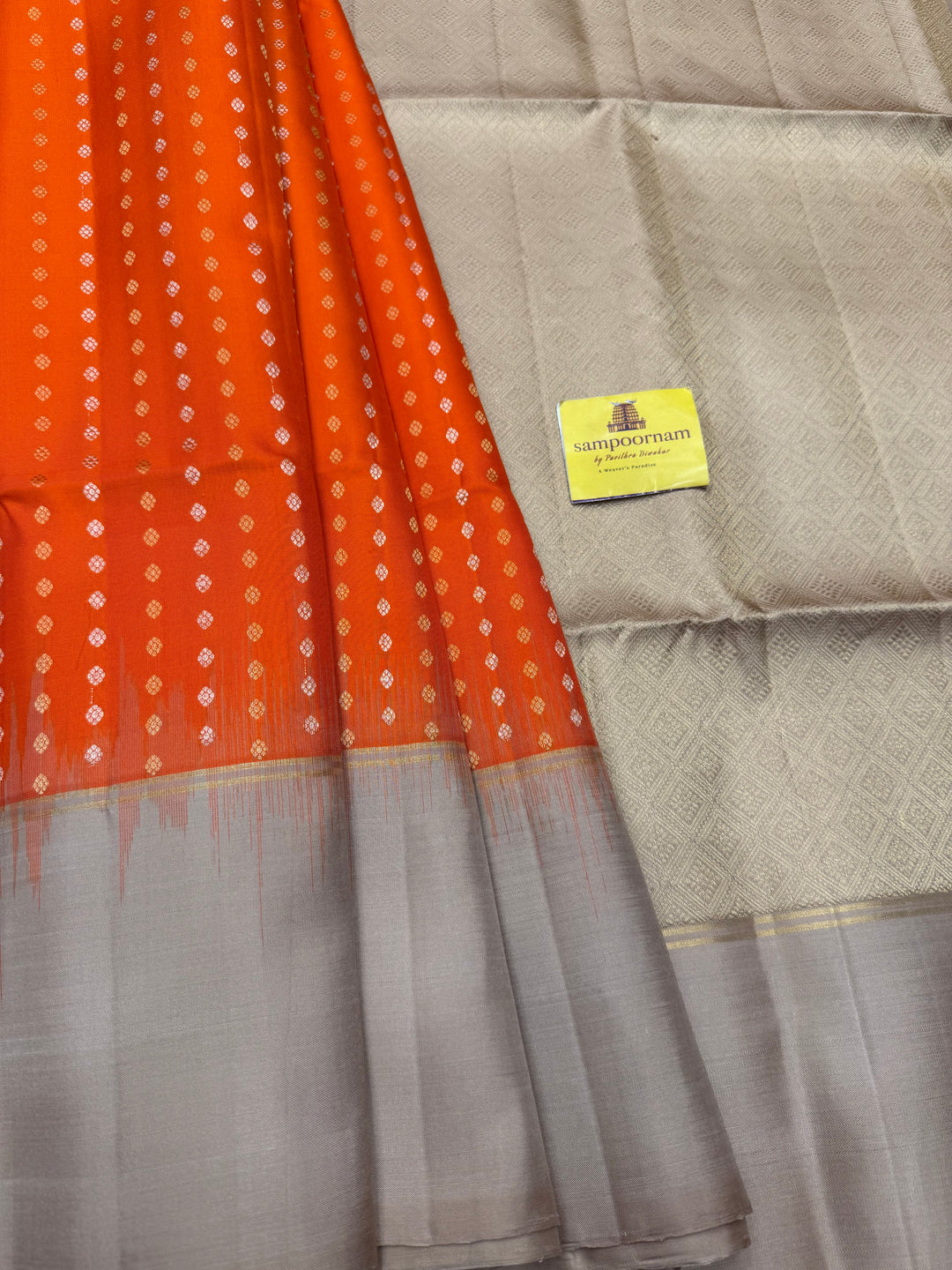 Fanta Orange with Beige , Rich Gold & Silver Floral Butta in the body and Grand Pallu Pure Soft Silk Saree